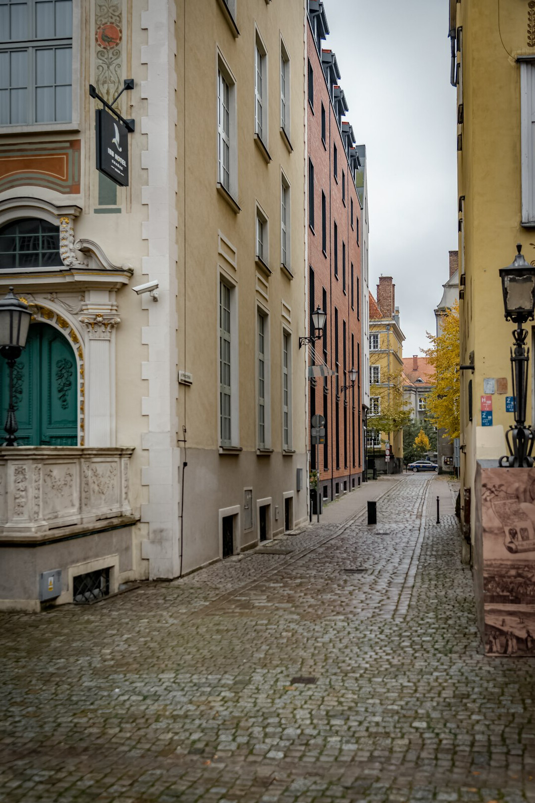 Historic old town street with colorful townhouses in Poland