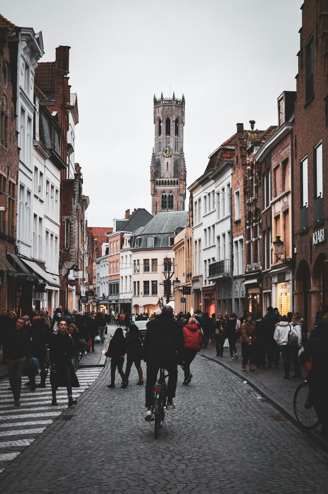 City street with historic buildings and pedestrians