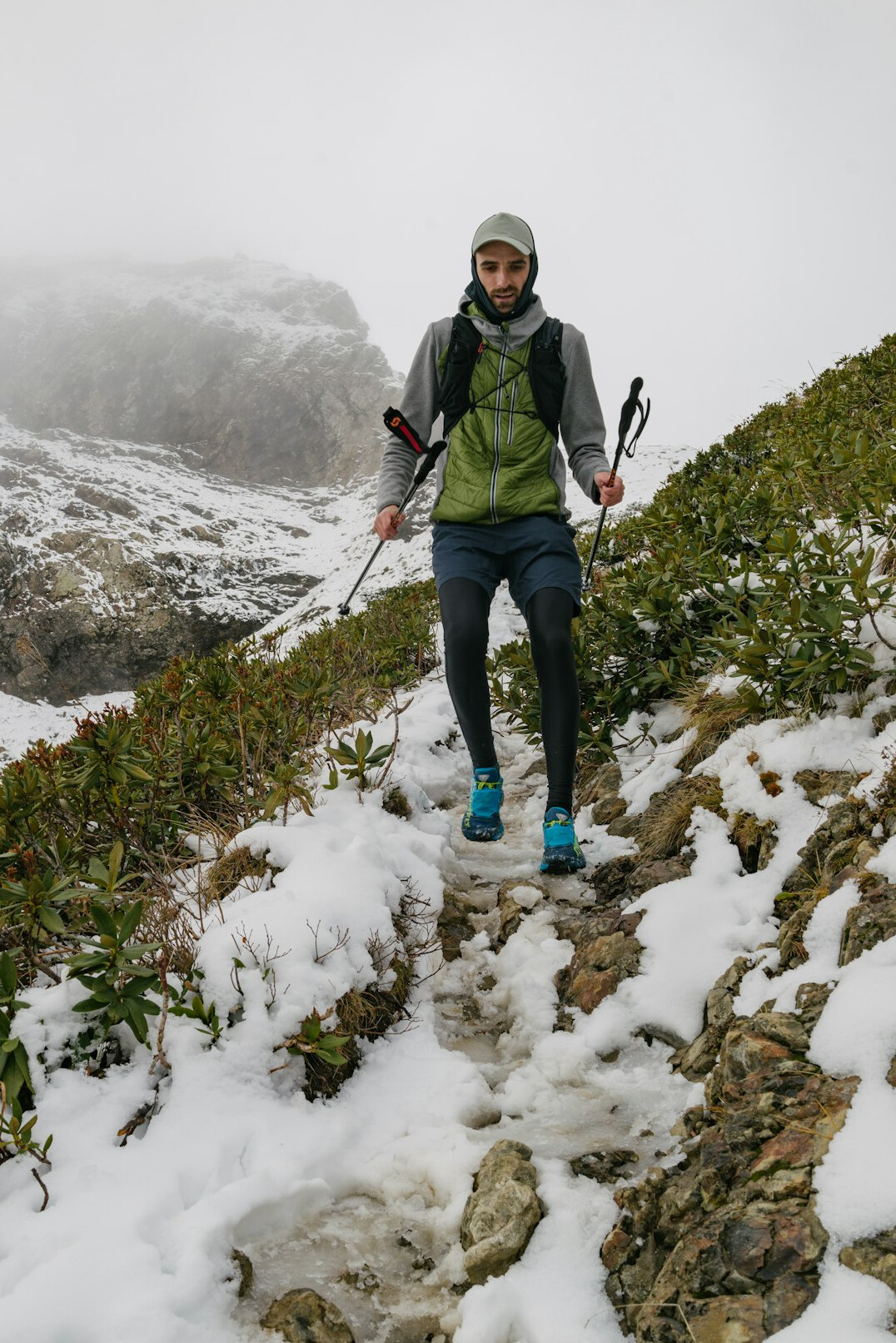 hiker on mountain trail